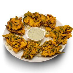 Crispy Pakoras with sauce served at Erroll's Kebab House Peterhead